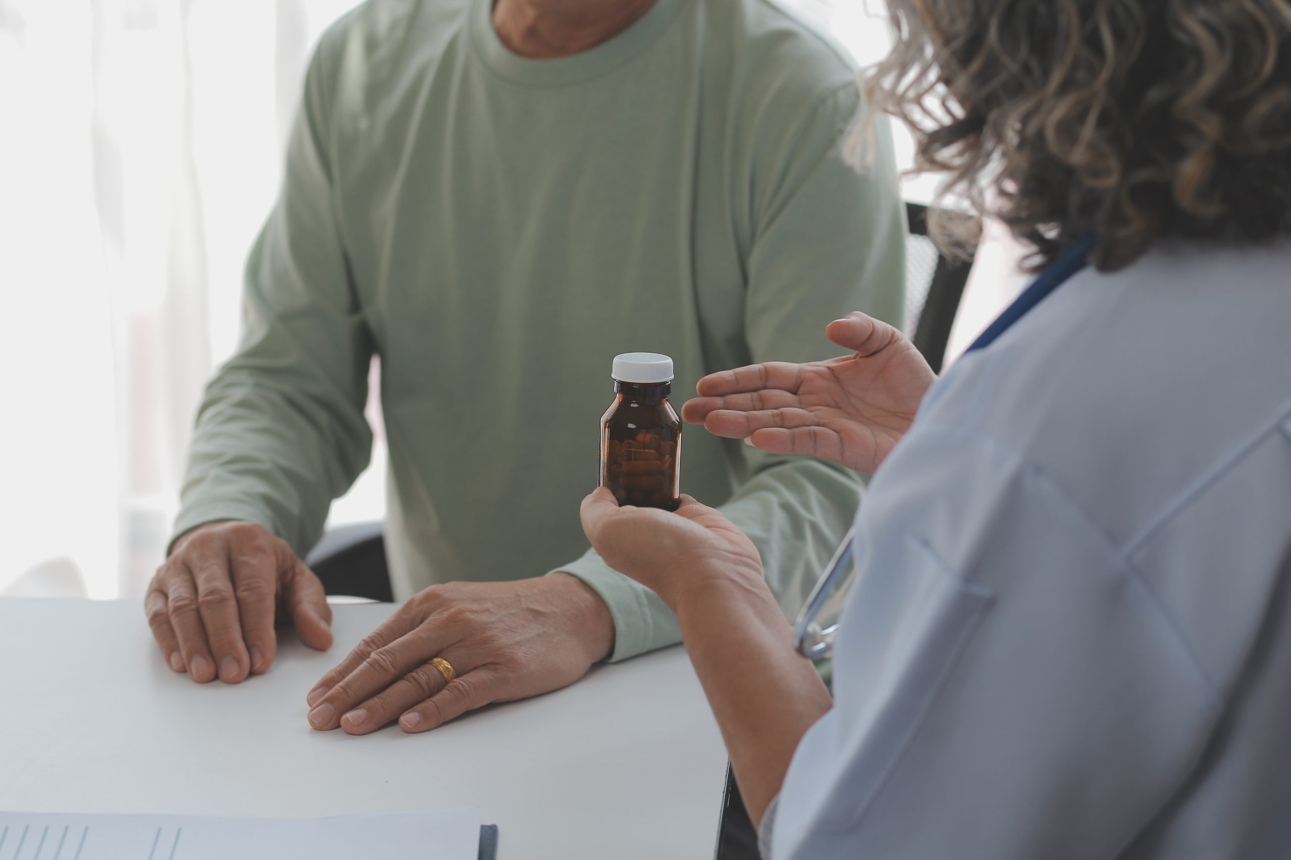 Patient managing a chronic condition with medication support from RightCare Family Medicine in Raleigh, NC